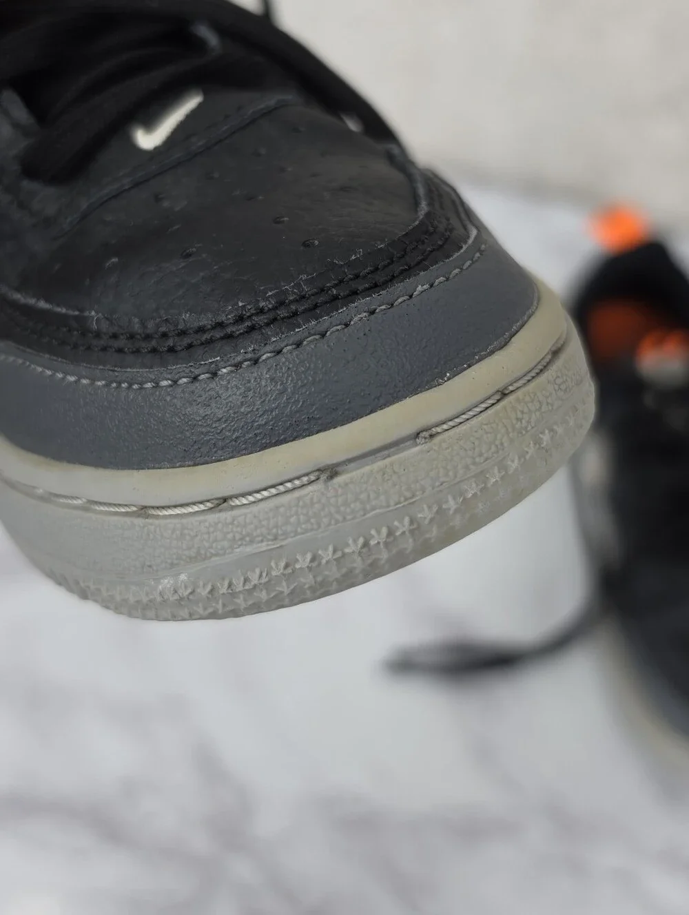 Nike Air Force Lv8 Kids Black & Gray Low-Top Sneakers with Orange Accent